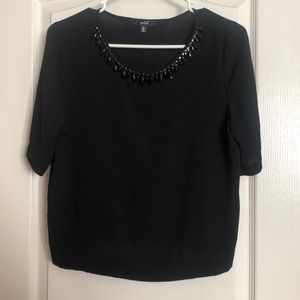 Black blouse with bead collar